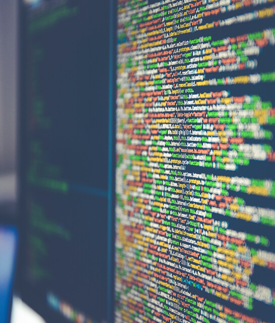 Datenintegration Auf einem Computerbildschirm dargestellter Quellcode, der die Datenintegrationsfunktion von microm symbolisiert.